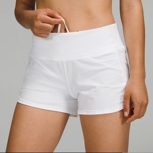 White.     lululemon speed ups     never worn